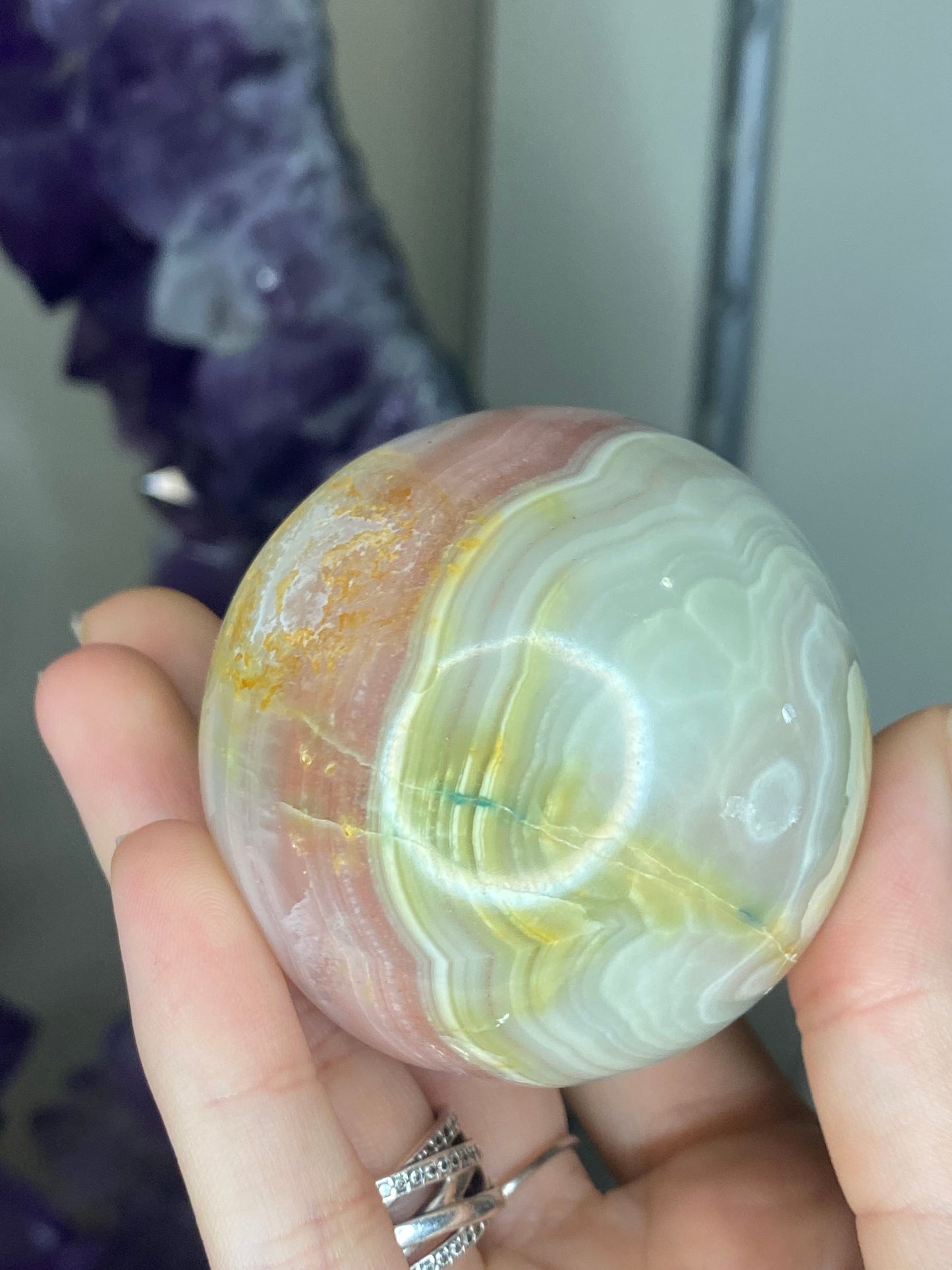 Pink banded onyx sphere