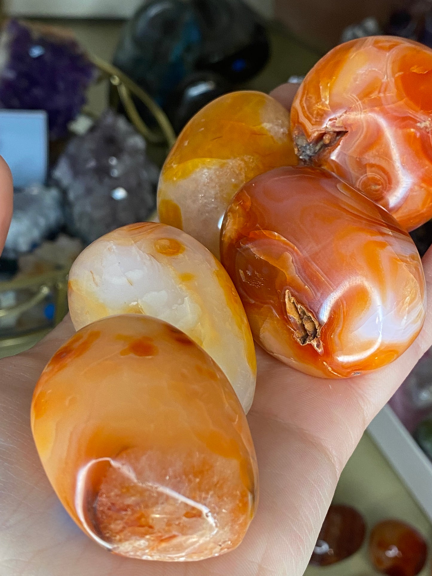 Banded carnelian palm stones