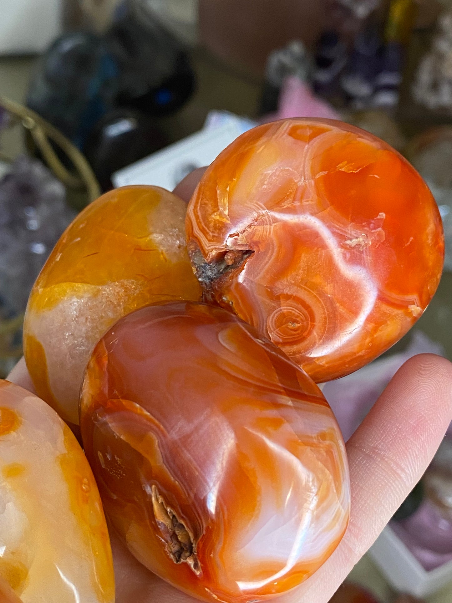 Banded carnelian palm stones