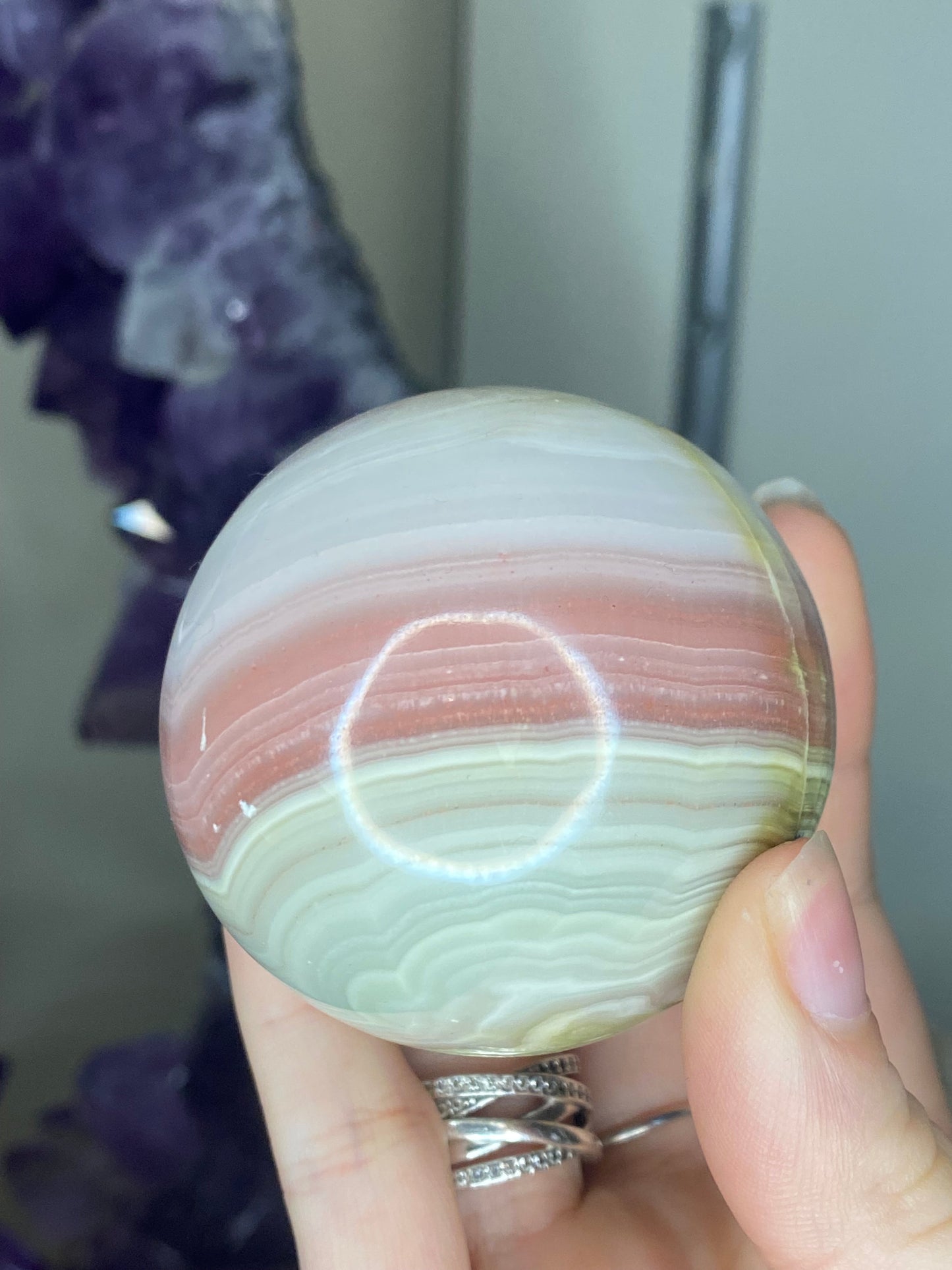 Pink banded onyx sphere