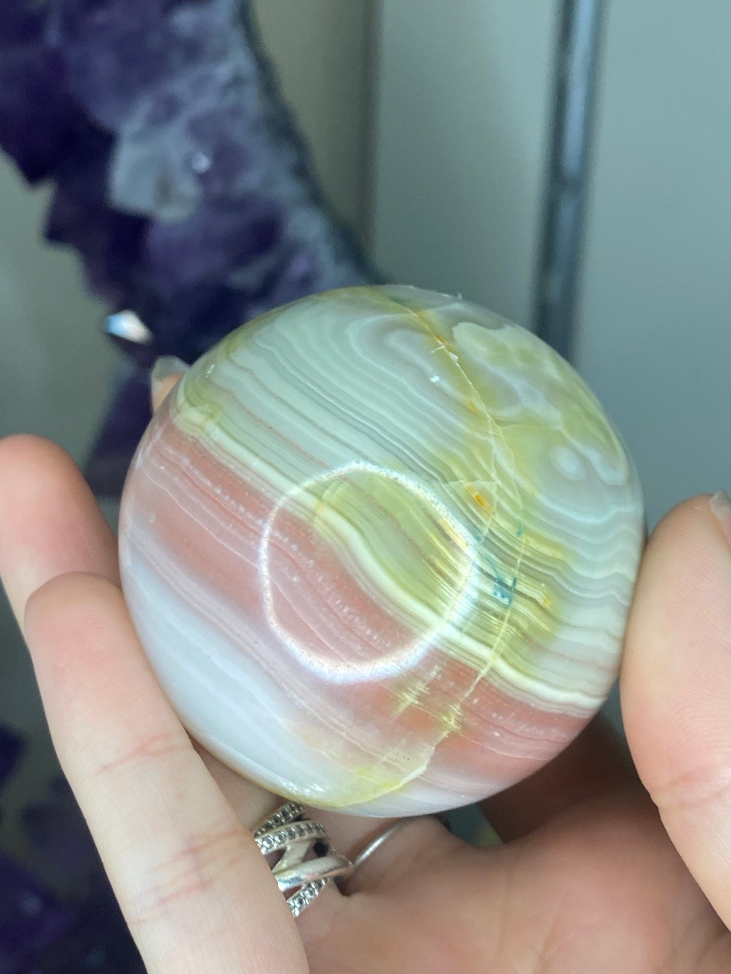 Pink banded onyx sphere