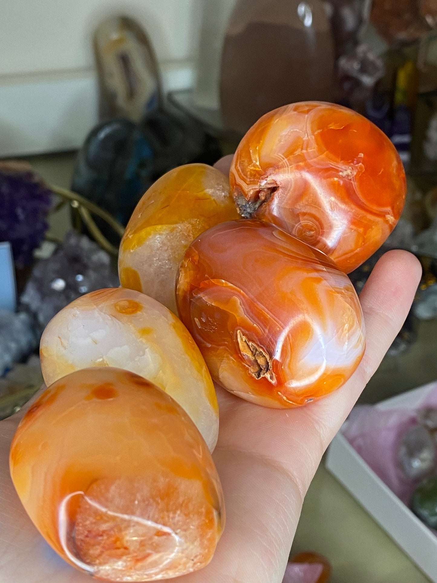 Banded carnelian palm stones