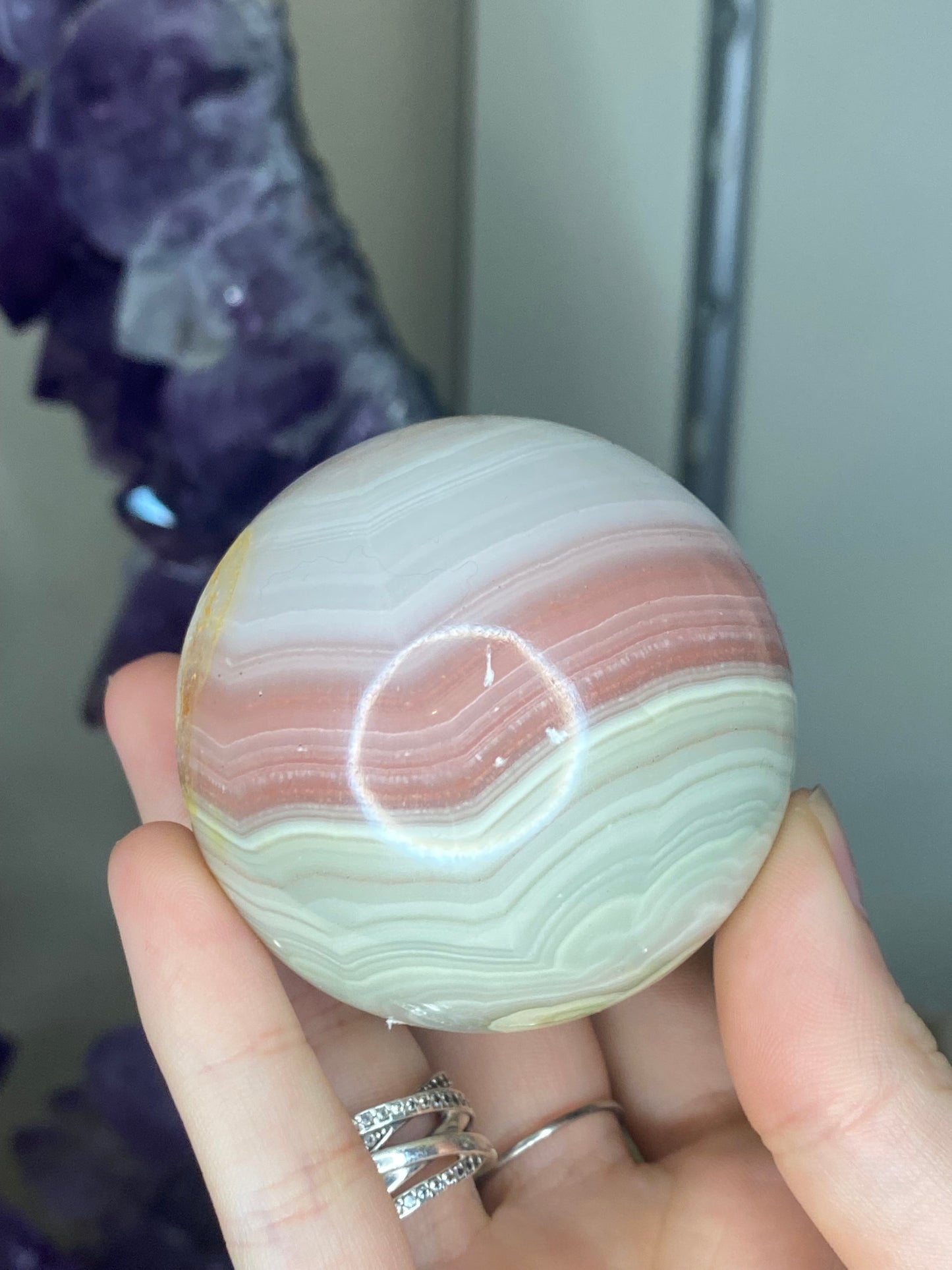 Pink banded onyx sphere