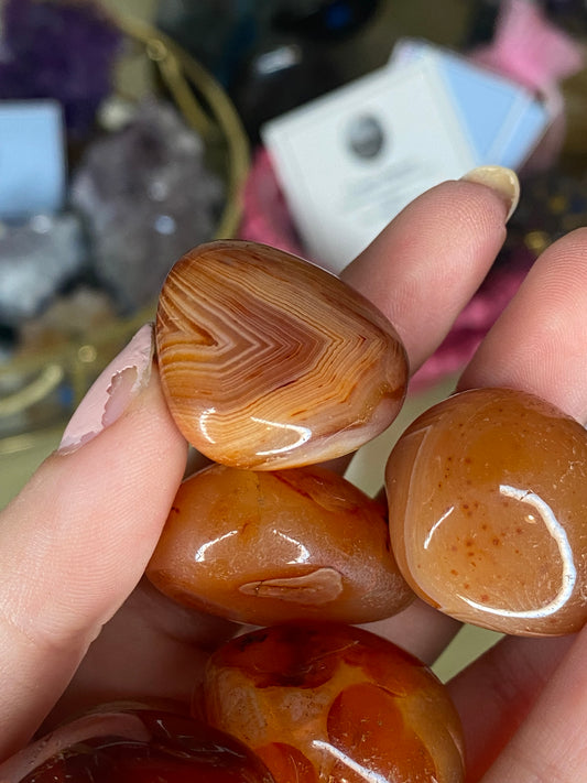 Banded carnelian tumbled stones